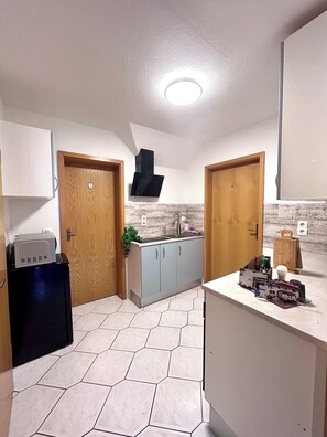 Family Condo, Non Smoking, Pets Allowed | Private kitchen | Full-size fridge, microwave, stovetop, electric kettle