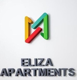 A logo with a stylized 'M' and the text 'ELIZA APARTMENTS'. - Eliza Apartments - free parking - by NEO (Timișoara)