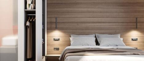 Une chambre moderne avec une tête de lit en bois, une armoire intégrée, des tables de chevet et un lit recouvert d’une couette blanche.