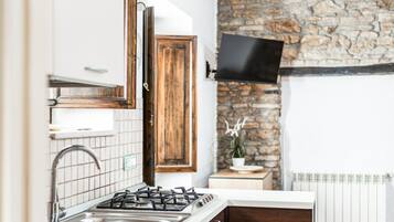 Refrigerador, horno, parrilla de estufa y cafetera y tetera