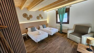 Tabla de planchar con plancha, wifi y ropa de cama