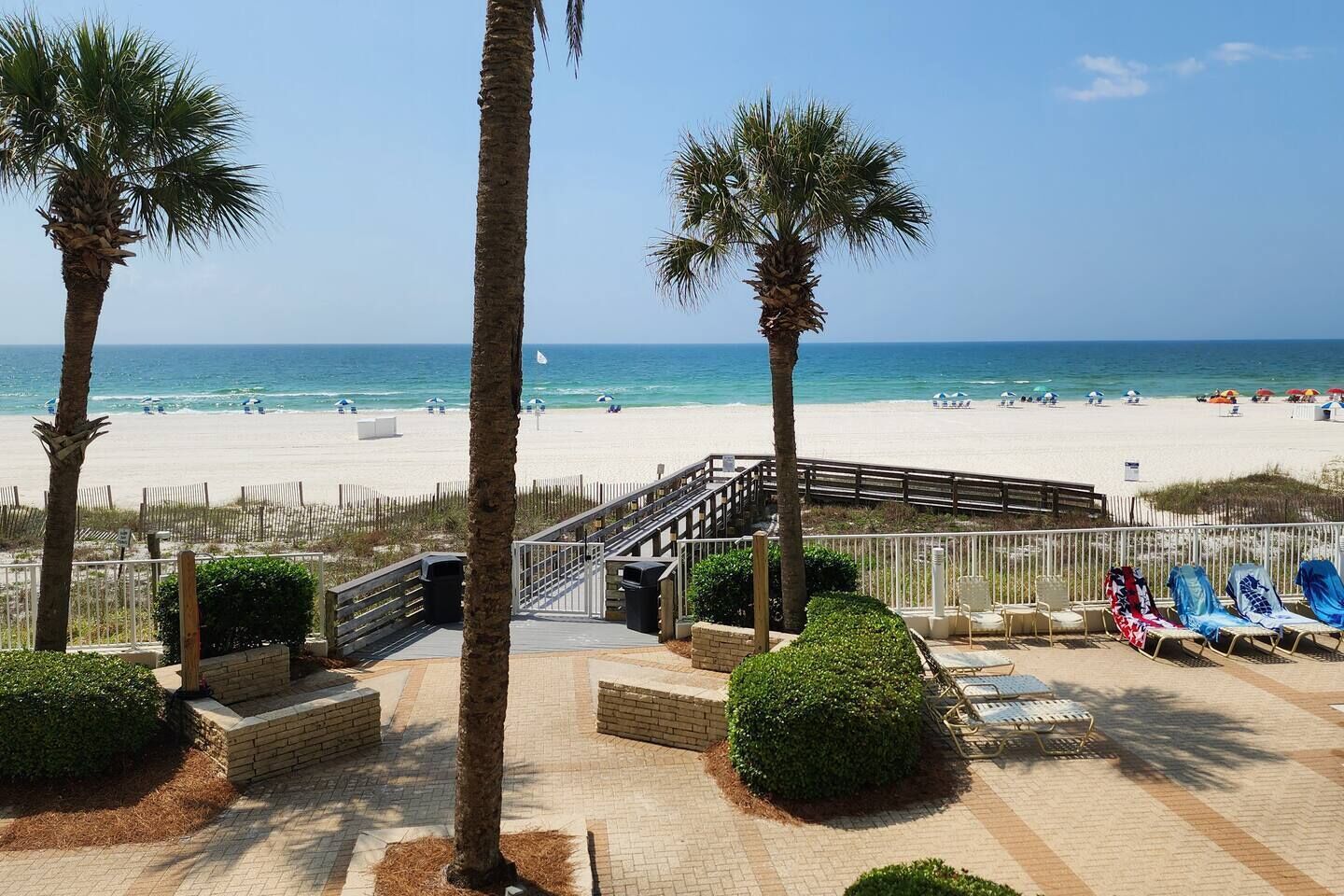 On the beach, sun loungers, beach towels