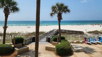 On the beach, sun loungers, beach towels