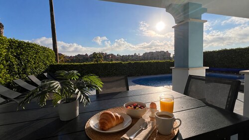 Chic Modern Villa with Heated Pool & Scenic Golf Course Views