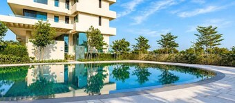 Waterfront Apartment w/ Sea Views & Pool Access