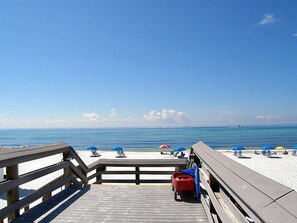 A wooden pier leading to a beach with white sand and clear blue water. - 🌴Summit at Tops'l 612 | Large Balcony with Gulf Views | Pool | Walk to Beach🌞 (Miramar Beach)