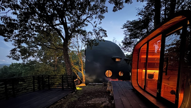 A unique geodesic dome house with a wooden deck and glass windows. - Oscar winning living @ Livingstations (Woodstock)