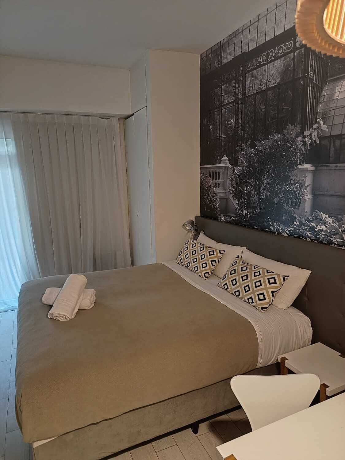 1 habitación, tabla de planchar con plancha, wifi y ropa de cama 