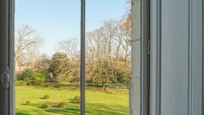 Habitación cuádruple, vista al jardín | Interior