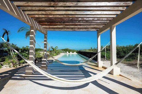 Beachfront Paradise with Shared Pool