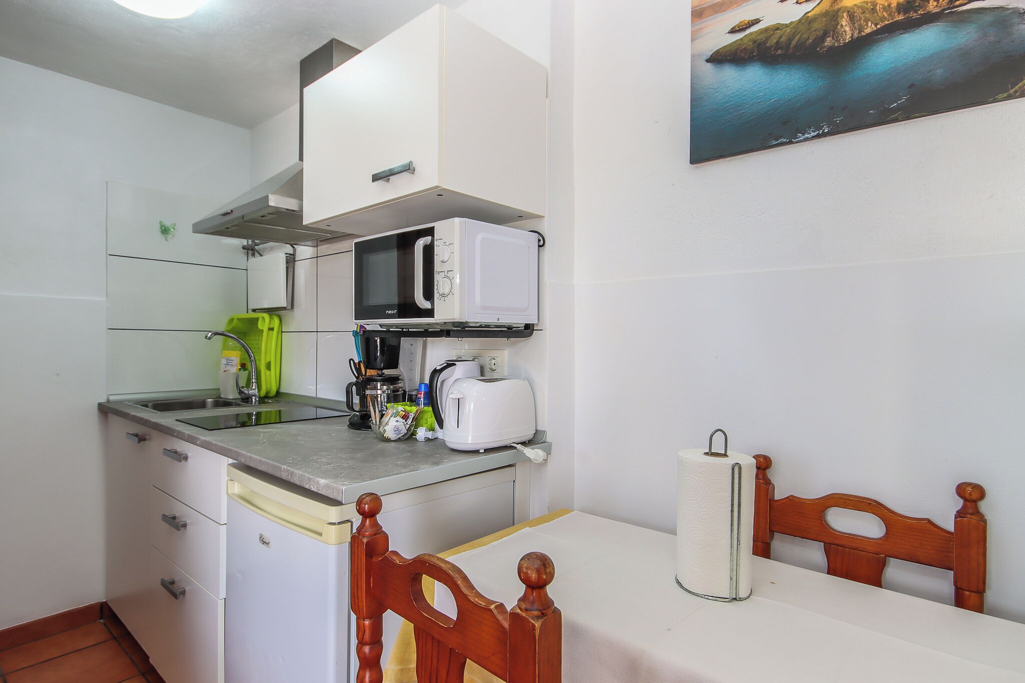 Apartment, Garden View | Private kitchen | Fridge, microwave, stovetop, cookware/dishes/utensils