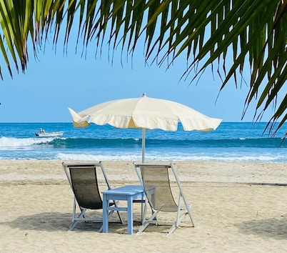 JUNTO AL RIO BEACHFRONT BUNGALOWS