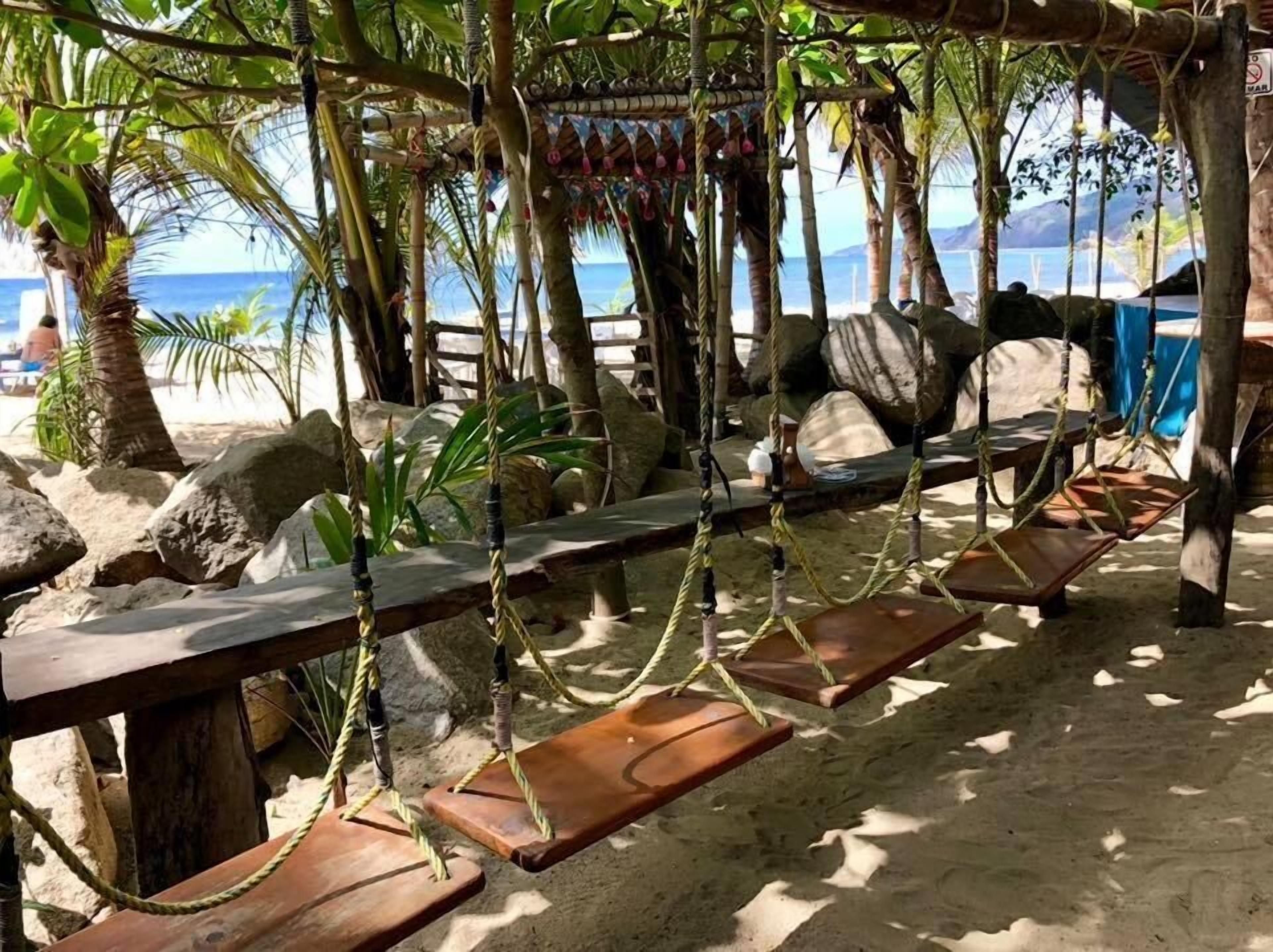On the beach, sun-loungers, beach umbrellas, beach towels