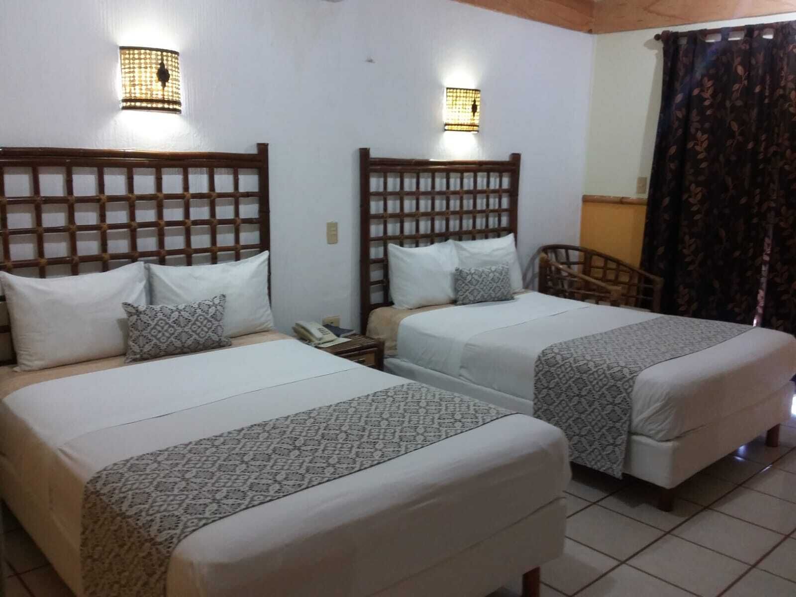 Kamar Double, 2 Tempat Tidur Double, Bebas Asap Rokok, AC | Ruang kerja ramah laptop dan Wi-Fi gratis