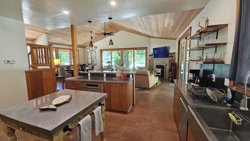 BRAND NEW LISTING Peaceful Riverfront Home - Hot Tub / EV Charger