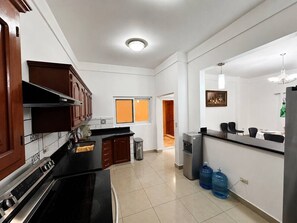 Coffee/tea maker, fridge, microwave, oven