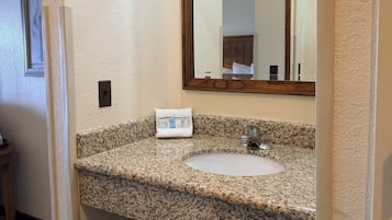 Combined shower/bathtub, hair dryer, towels, soap