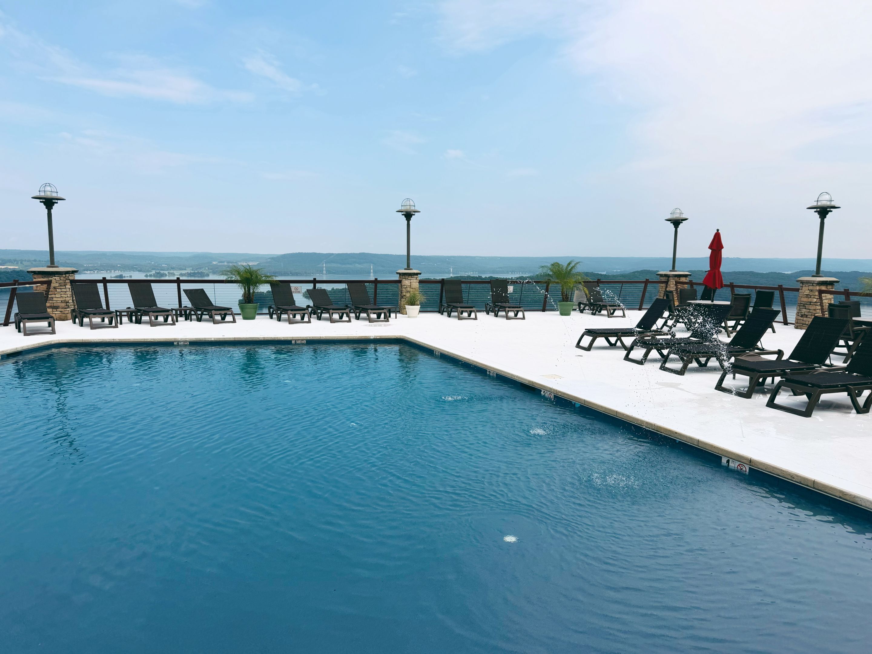 Seasonal outdoor pool, pool loungers