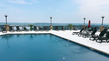 Seasonal outdoor pool, pool loungers