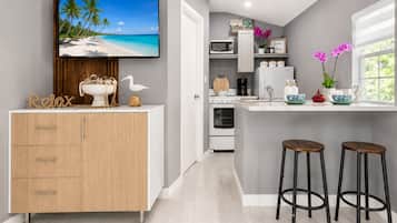 Fridge, microwave, stovetop, coffee/tea maker