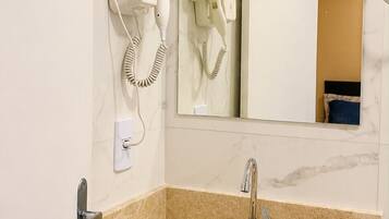 Shower, free toiletries, hair dryer, towels