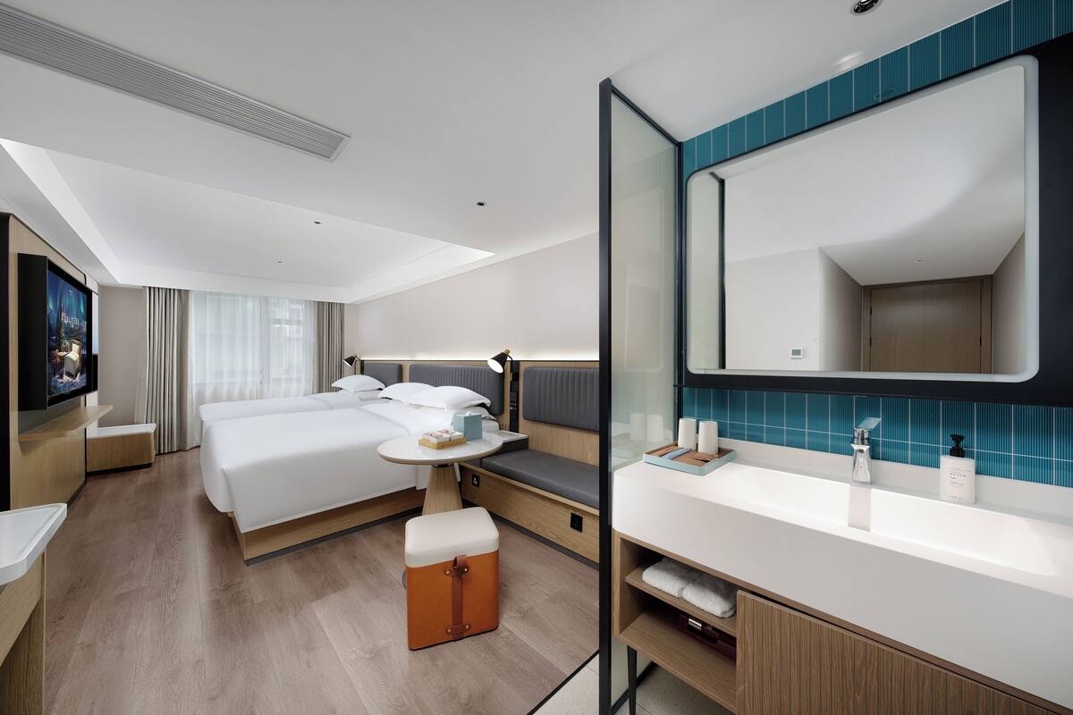 Family Suite, Multiple Beds, Private Bathroom, City View | Premium bedding, down comforters, pillowtop beds, minibar (free items)