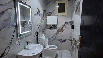 Family Apartment | Bathroom | Free toiletries, hair dryer, towels, soap