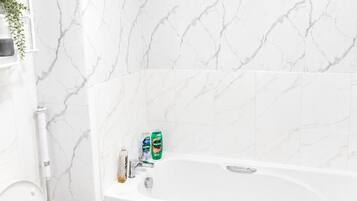 Hair dryer, towels, soap, toilet paper