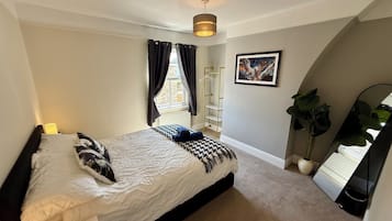 Iron/ironing board, travel crib, free WiFi, bed sheets