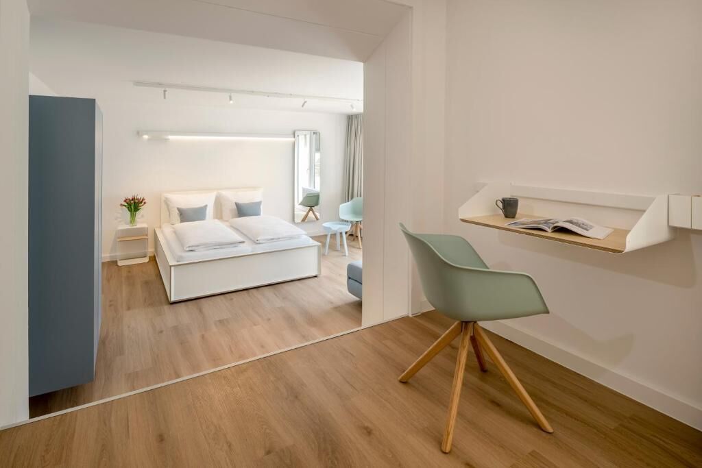Suite, Patio, Courtyard View | Desk, laptop workspace, blackout drapes, iron/ironing board (on request)