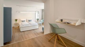 Suite, Patio, Courtyard View | Desk, laptop workspace, blackout drapes, iron/ironing board (on request)