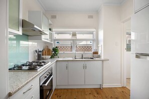 Private kitchen - Biarritz at Henley Where Days Begin by the Sea (Henley Beach)