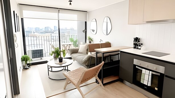 A modern kitchen with a dining area, large windows, and a view of the city. - Depto. moderno y acogedor I Wifi I AC (Santiago)