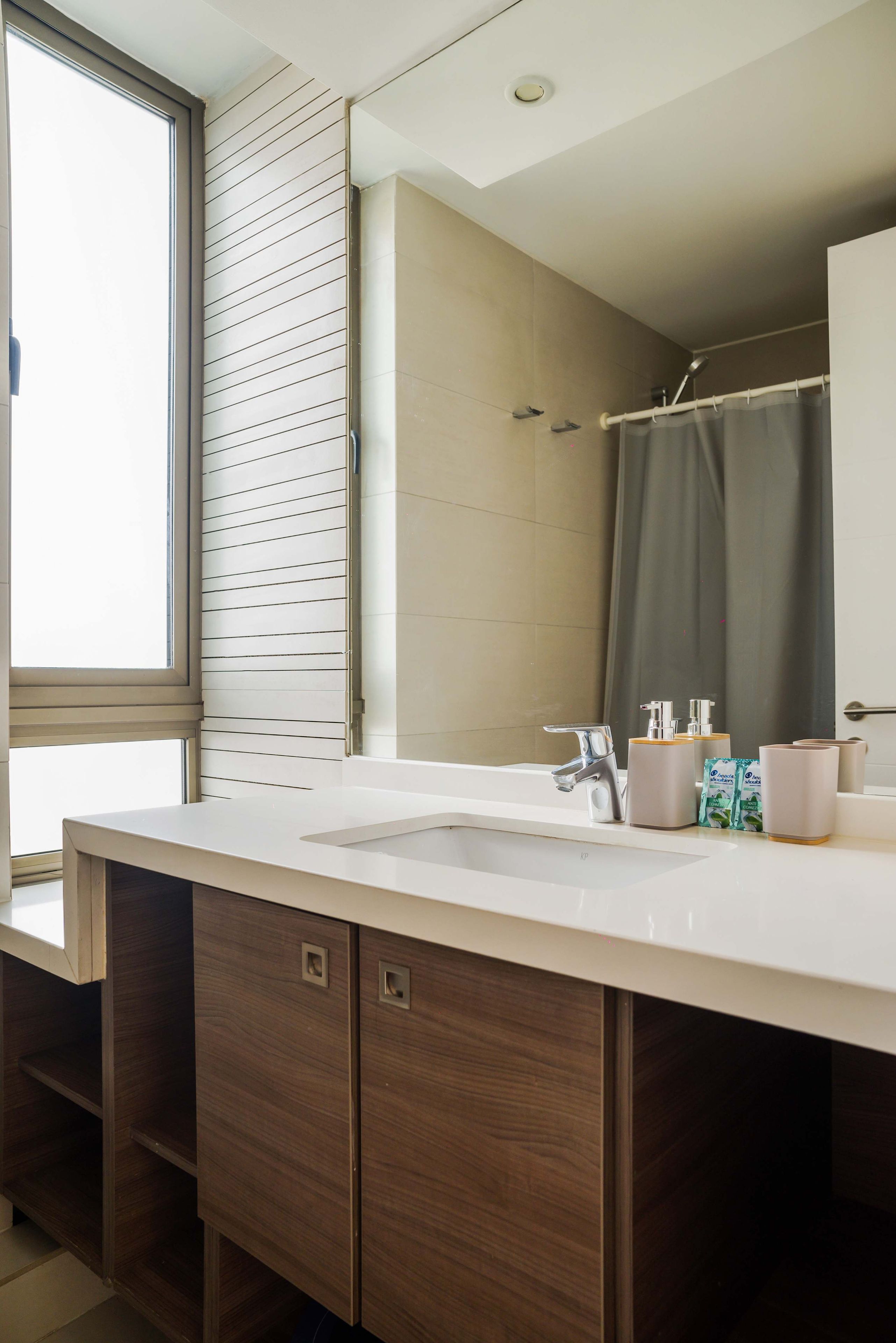 Shower, hair dryer, towels, shampoo