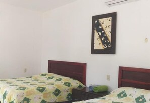 Habitación familiar doble, vistas a la playa | Wifi gratis
