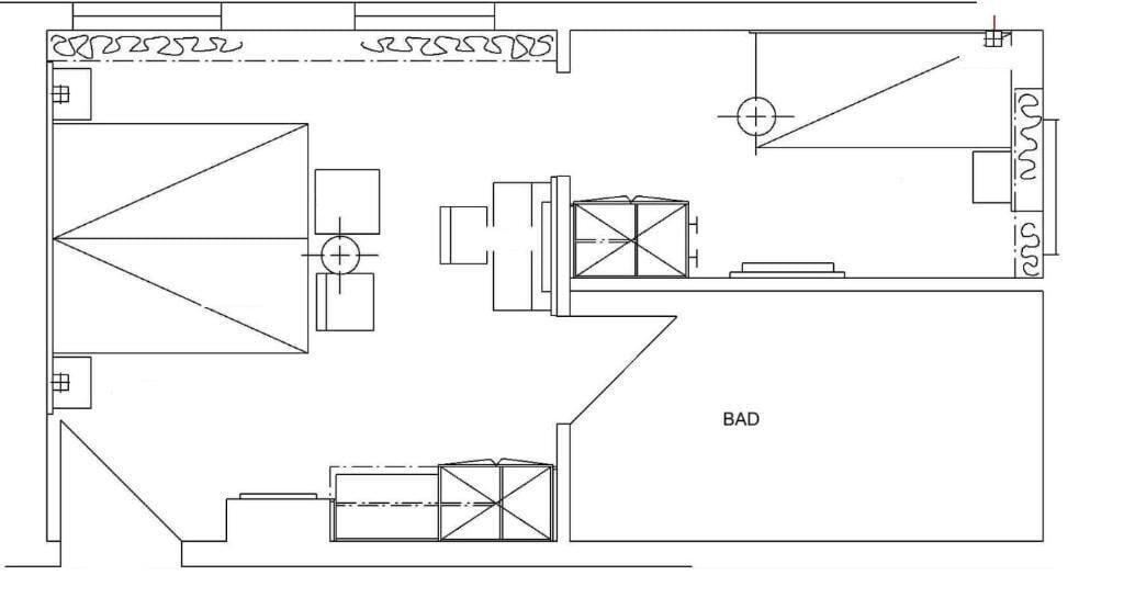 Een plattegrond met een ruime open ruimte, een keuken en een badkamer.
