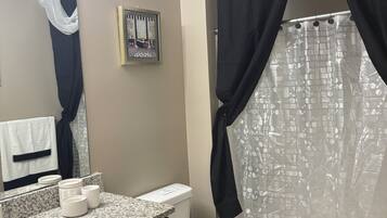 Hair dryer, towels, soap, toilet paper