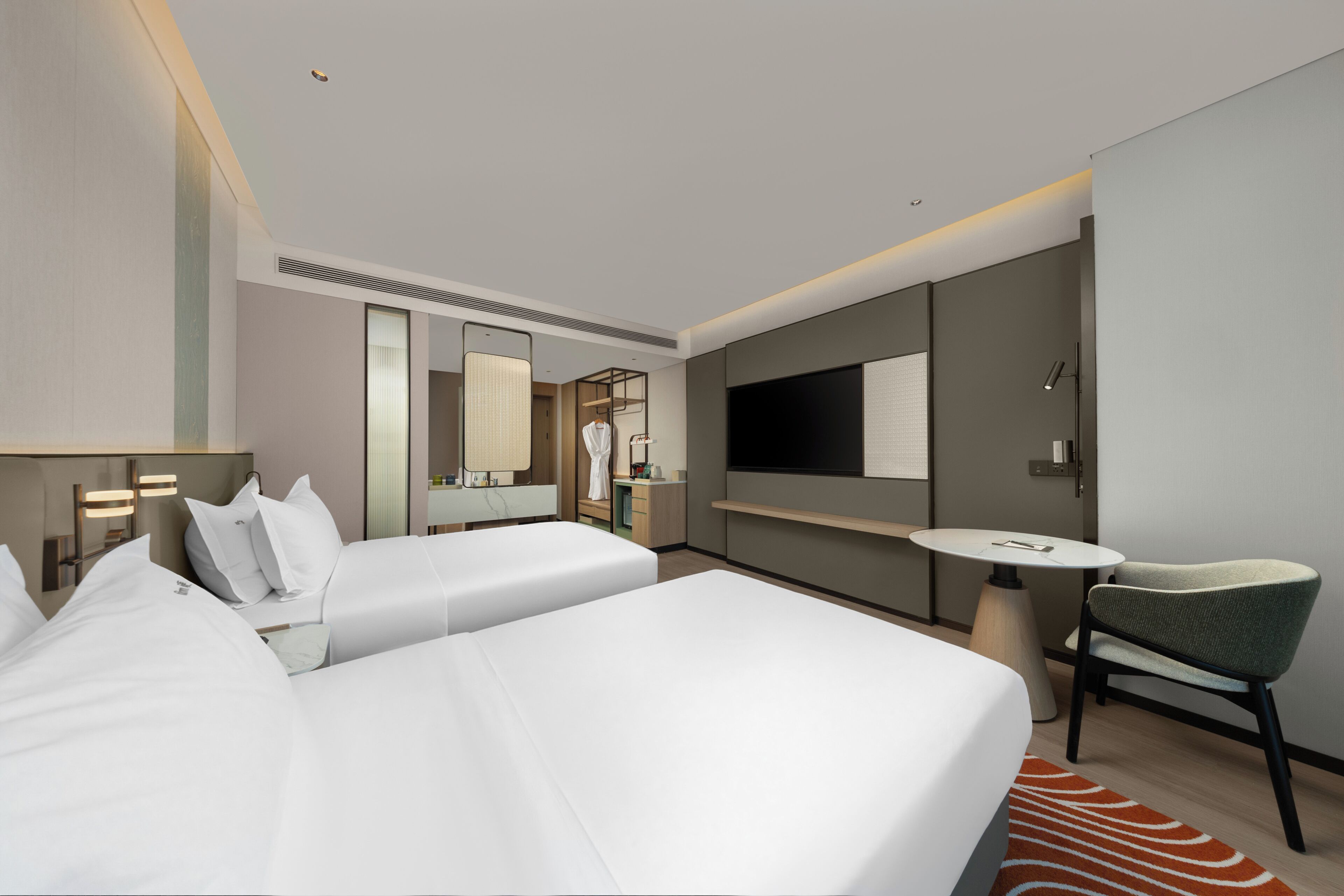 Down comforters, minibar (some free items), in-room safe, desk