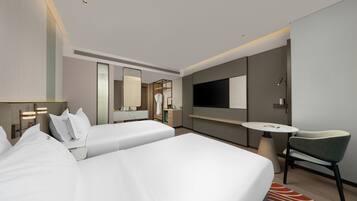 Down comforters, minibar (some free items), in-room safe, desk