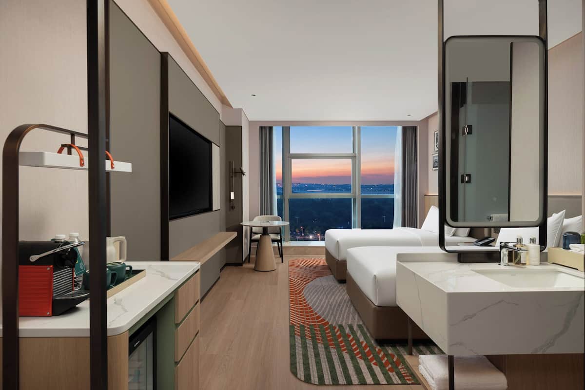 Habitación Premium | Edredón y artículos del minibar gratis 