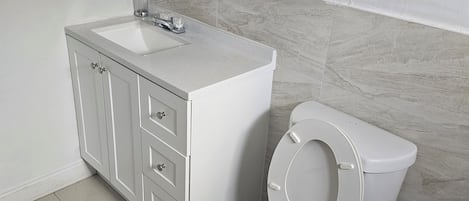 Hair dryer, towels, soap, toilet paper