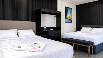 Deluxe Room, Beach View | In-room safe, blackout drapes