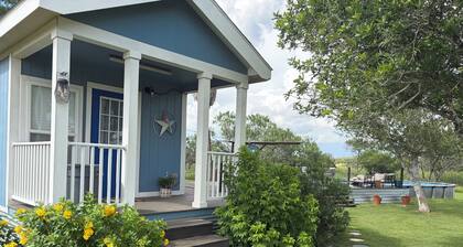 Cozy 1-bedroom cottage in serene Jourdanton with private pool and deck.