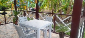 Apartment, Balcony, Garden View | Outdoor dining