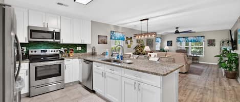 Coffee/tea maker, fridge, microwave, oven