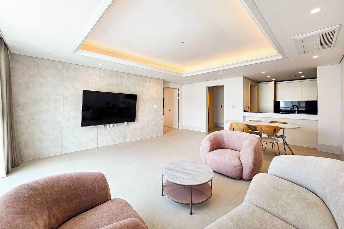 50-cm TV with cable channels, pay movies