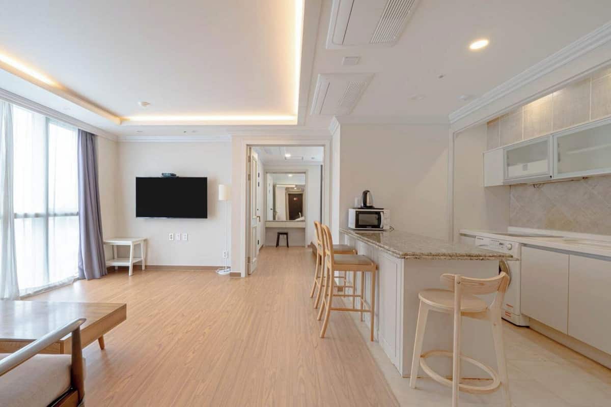 50-cm TV with cable channels, pay movies