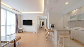 50-cm TV with cable channels, pay movies