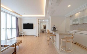 50-cm TV with cable channels, pay movies