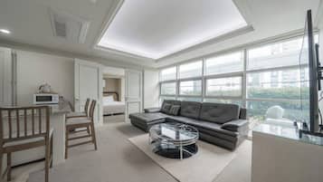 50-cm TV with cable channels, pay movies